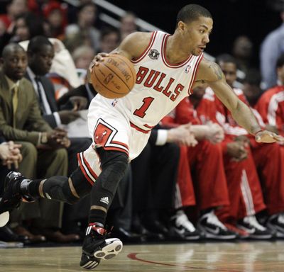 Chicago point guard Derrick Rose and the Bulls advanced to the second round. (Associated Press)
