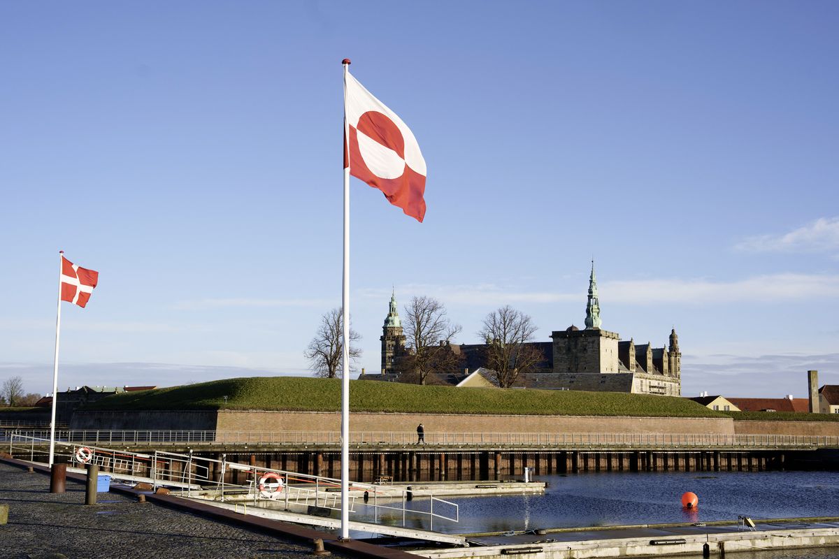 The Greenlandic flag waves at the Culture Harbor with Kronborg Castle in the background in Elsinore, Denmark.  (Getty Images)