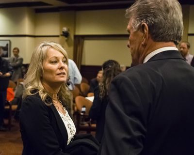 Idaho State Superintendent of Public Instruction Sherri Ybarra, left, speaks with Gov. Butch Otter during the legislative preview with reporters Jan. 6, 2017, at the State Capitol building Friday in Boise, Idaho. (Otto Kitsinger / AP)