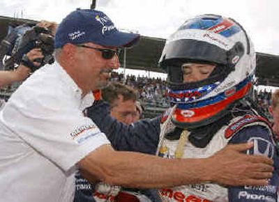 
Team co-owner  Bobby Rahal congratulates  Danica Patrick, after her fourth place finish. 
 (Associated Press / The Spokesman-Review)