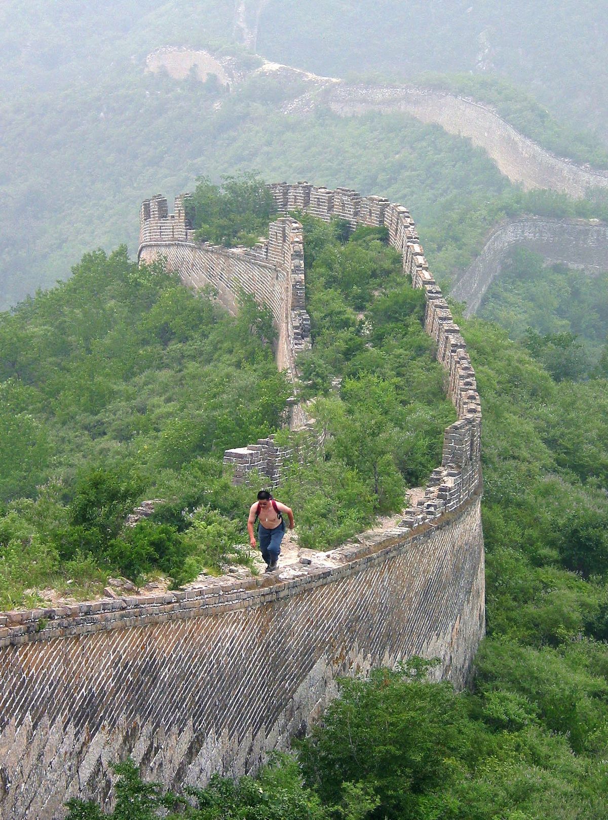 Above: A hiker climbs up a dilapidated section of the Great Wall of China, north of Beijing. Like India, China saw a big increase in American visitors toward the end of the decade.Associated Press photos (Associated Press photos)