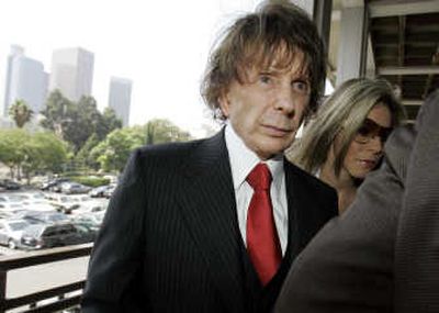 
Phil Spector arrives at court in Los Angeles with his wife, Rachelle,  on Tuesday, the seventh day of deliberations. Associated Press
 (Associated Press / The Spokesman-Review)