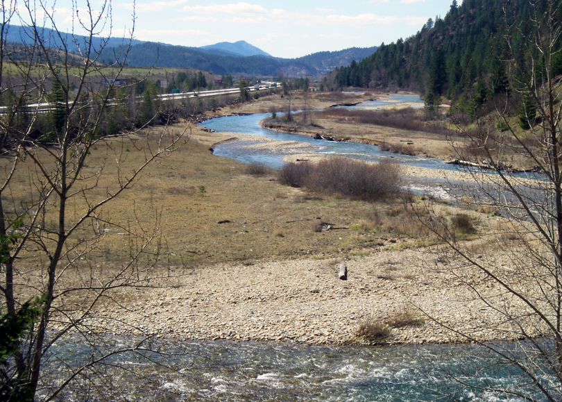 The South Fork Coeur d'Alene River near Kellogg, Idaho has been impacted by historical mining activites. Since 2004, the USGS, in cooperation with the Environmental Protection Agency, has maintained a water-quality monitoring program in the Coeur d'Alene and Spokane River basins of northern Idaho and eastern Washington. This April 2013 photo was taken near Kellogg. (USGS / Kevin Kirlin)