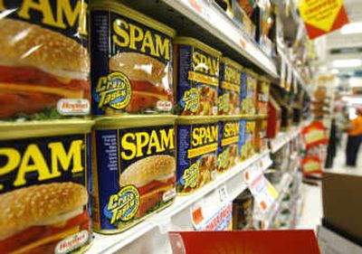 
Cans of Spam line the shelves at a store in Berlin, Vt. Sales of Spam are rising as consumers turn more to lunch meats and lower-cost foods as a way of stretching their  already stretched food budgets. Associated Press photos
 (Associated Press photos / The Spokesman-Review)