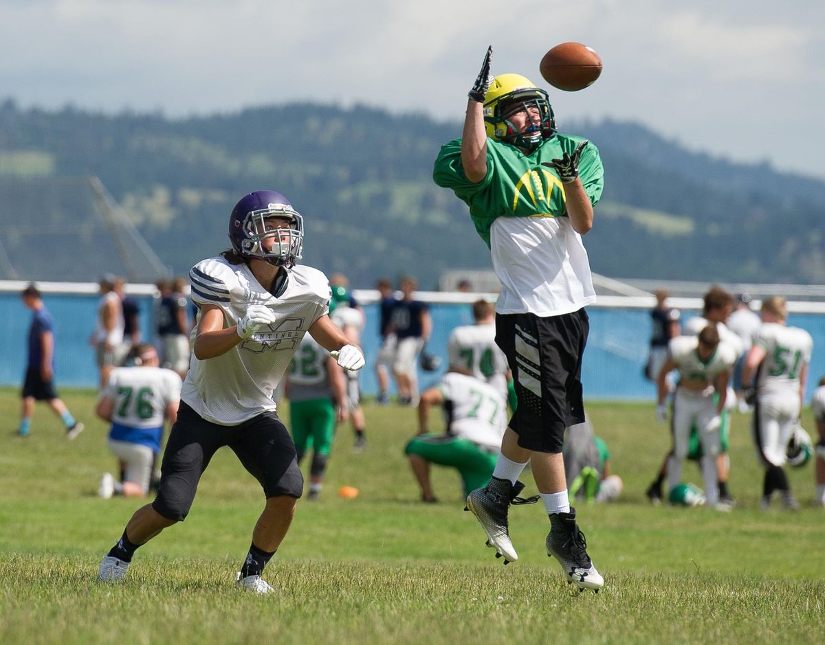 Shadle Park’s Caleb Clark breaks up a pass intended for a (Missoula) Sentinel player  during the annual Border League Football Camp on Tuesday, June 20, 2017, at Central Valley High School in Spokane Valley, Wash. (Tyler Tjomsland / The Spokesman-Review)