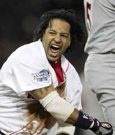 
Manny Ramirez of the Red Sox exults after an RBI single in the seventh. 
 (Associated Press / The Spokesman-Review)