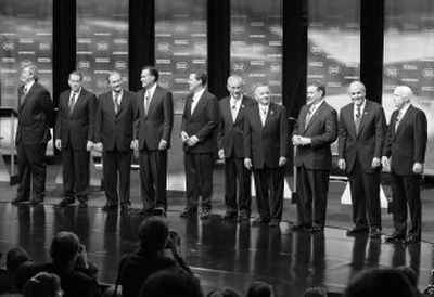 
Republican presidential hopefuls, from left, Duncan Hunter, Mike Huckabee, Jim Gilmore, Mitt Romney,  Sam Brownback, Ron Paul, Tom Tancredo, Tommy Thompson,  Rudolph Giuliani and John McCain line up before the presidential primary debate Thursday at the Ronald Reagan Library. 
 (Associated Press / The Spokesman-Review)