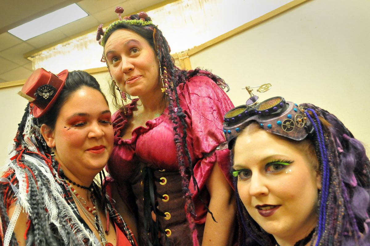Jessica Vowels, left, Ammie Hague, center, and Jennifer Baker display their cyberpunk, fairy and steampunk looks at SpoCon 2011.