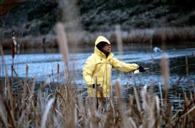 
Pat Fairchild of Spokane casts for rainbow trout in January at Rocky Ford Creek north of Moses Lake. She was fishing with her husband, Nick, and using equipment she'd received as a Christmas present. Soon after this photo was taken, she broke in the new rod with a fat rainbow about 18 inches long.
 (Photos by Rich Landers/ / The Spokesman-Review)