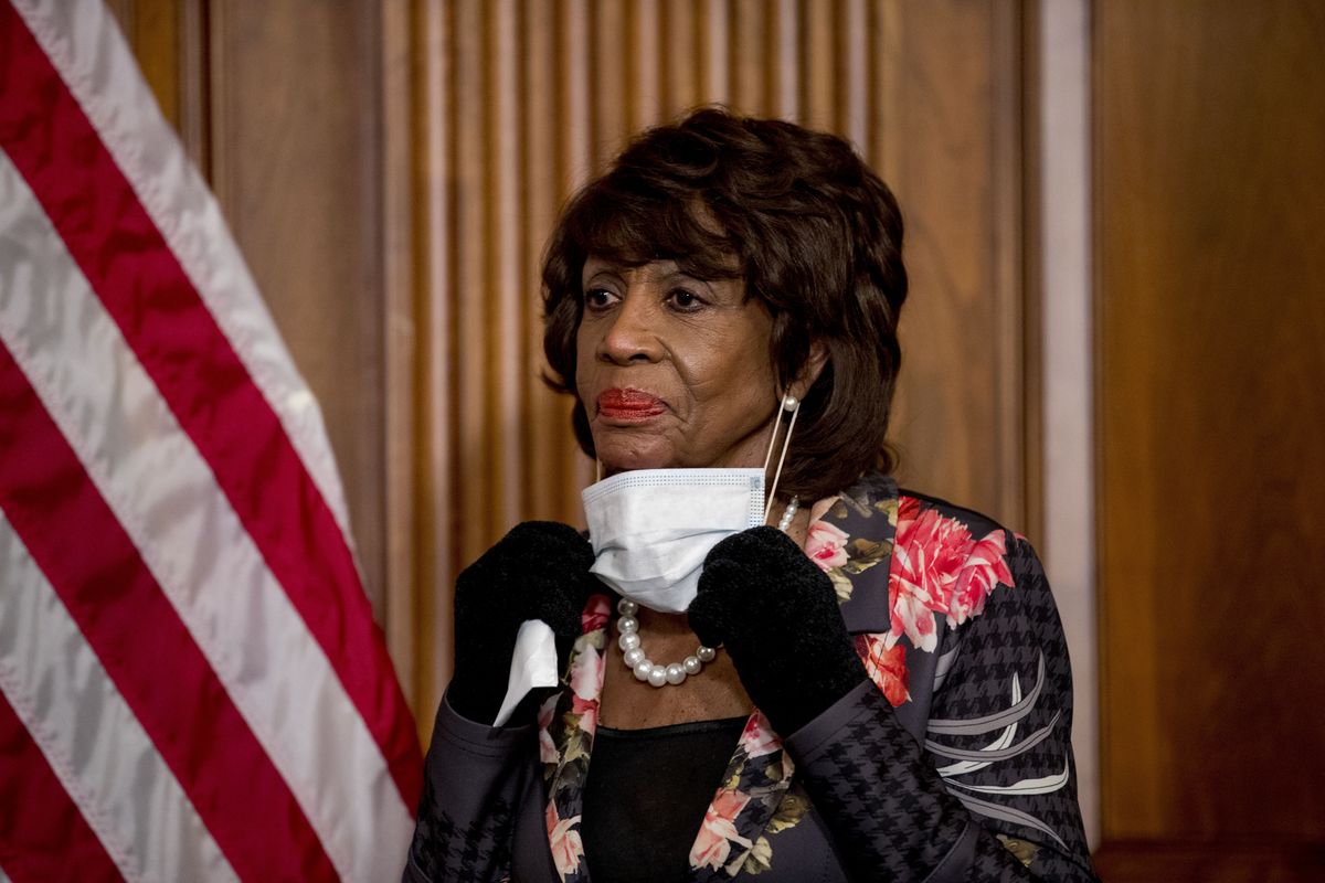 House Financial Services Committee Chairwoman Maxine Waters takes her mask off to speak April 23 during a signing ceremony for the Paycheck Protection Program and Health Care Enhancement Act, H.R. 266, after it passed the House on Capitol Hill.  (Andrew Harnik/Associated Press)