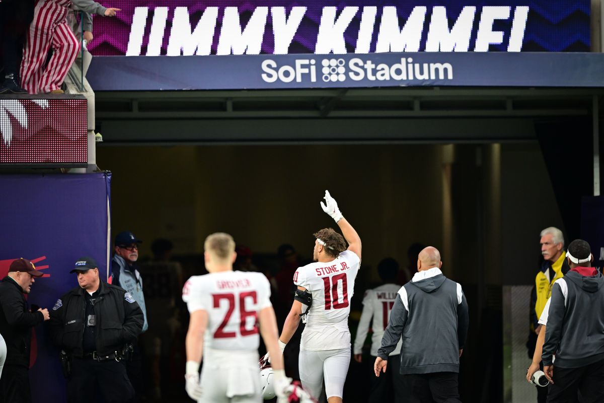 Washington State edge rusher Ron Stone Jr. (10) waves to a fan as he heads to the locker room after the Cougars fell to Fresno State in the Jimmy Kimmel LA Bowl on Saturday at SoFi Stadium in Inglewood, California.  (Tyler Tjomsland/The Spokesman-Review)