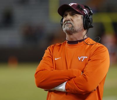 In this Oct. 25, 2018 photo, Virginia Tech defensive coordinator Bud Foster looks at the scoreboard during the second half of an NCAA college football game against Georgia Tech, in Blacksburg, Va. Foster says the upcoming football season will be his final as an assistant coach. Foster has been the Hokies’ defensive coordinator since 1995. His 33 years on staff makes him the longest tenured assistant coach in the country at the same school. (Steve Helber / Associated Press)