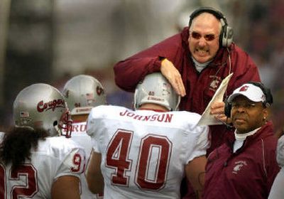 WSU defensive coaches Robb Akey, top, and Mike Walker oversee a vastly improved unit after making some changes in the off-season. 
 (Christopher Anderson / The Spokesman-Review)