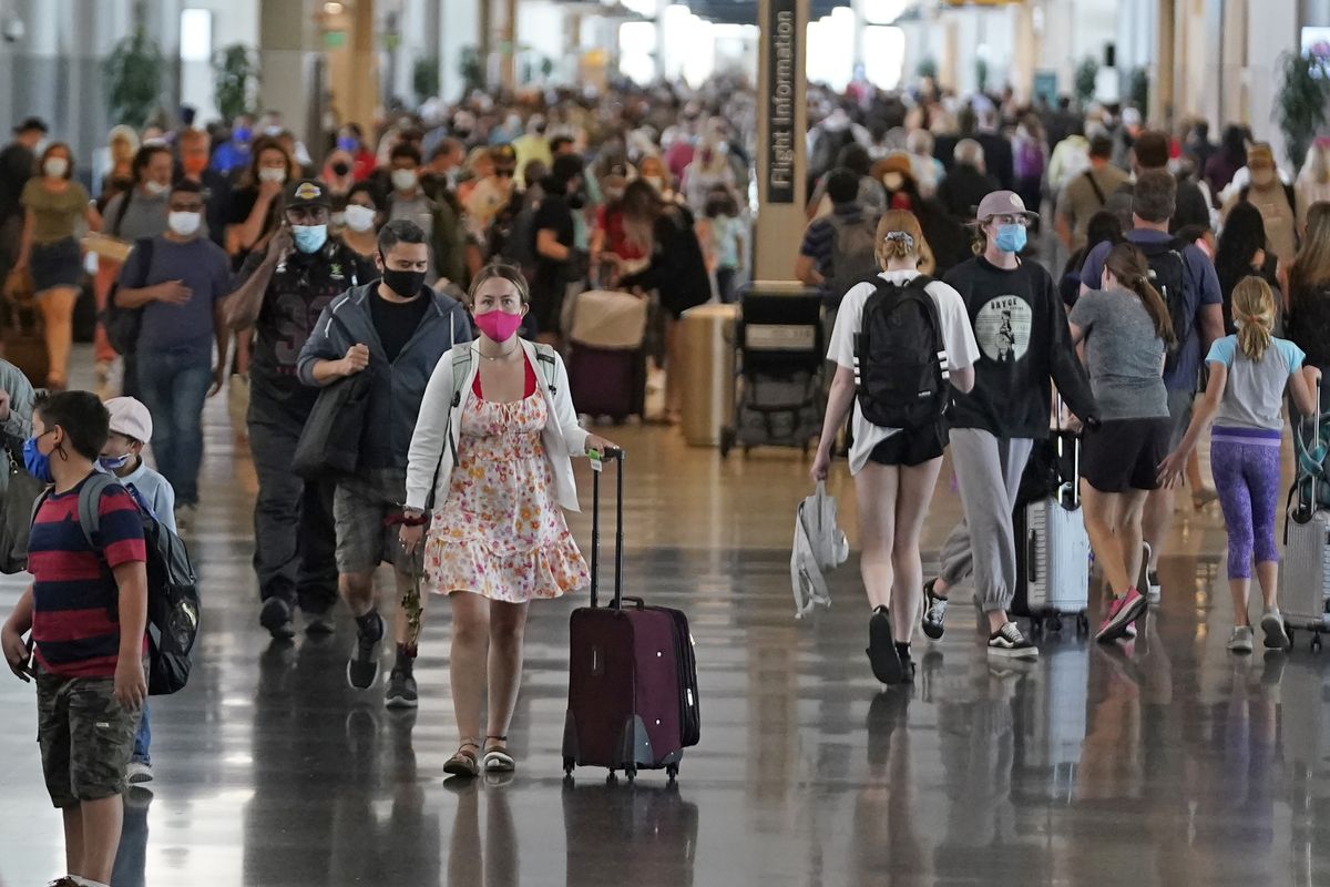 Although masks are still required in airports and on planes, airlines are reporting increasing cases of disruptive passengers refusing to wear masks.  (Rick Bowmer)