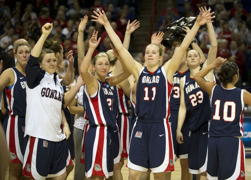 The Gonzaga Bulldogs wave goodbye to the fans and their basketball season after their 60-83 loss against Stanford in their regional final NCAA tournament women's college basketball game on Monday, March 28, 2011, in Spokane, Wash. (Colin Mulvany / The Spokesman-Review)