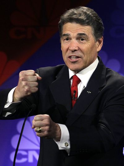 Presidential candidate Texas Gov. Rick Perry speaks during a debate Wednesday. (Associated Press)