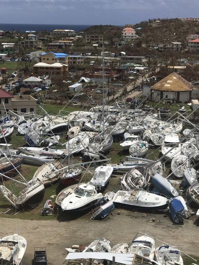 This Sept. 14, 2017, photo  shows some damaged boats at the Virgin Gorda Yacht Harbour in the aftermath of Hurricane Irma on Virgin Gorda, in the British Virgin Islands. (Guillermo Houwer / Associated Press)