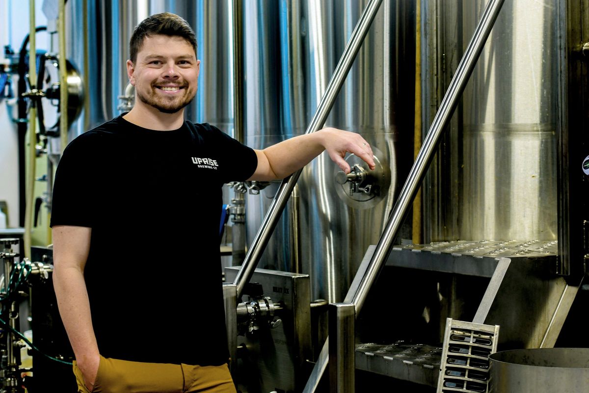 Brandon Hare, co-owner of Uprise Brewery, is photographed April 11 in the brewhouse.  (KATHY PLONKA/THE SPOKESMAN-REVIEW)