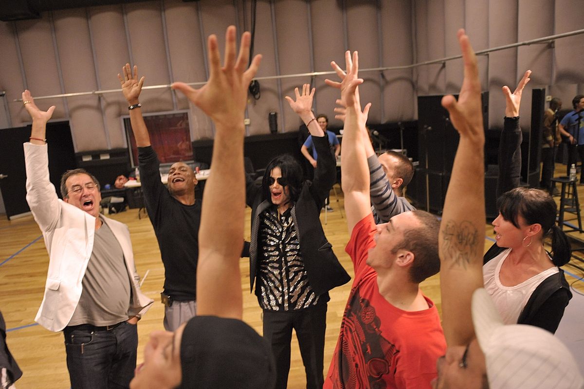 In this May 6, 2009, image released courtesy of Michael Jackson, pop star Michael Jackson, center, is shown in Los Angeles during rehearsals for his upcoming concert in London. Jackson, 50, died in Los Angeles on Thursday, June 25, 2009. (Associated Press)