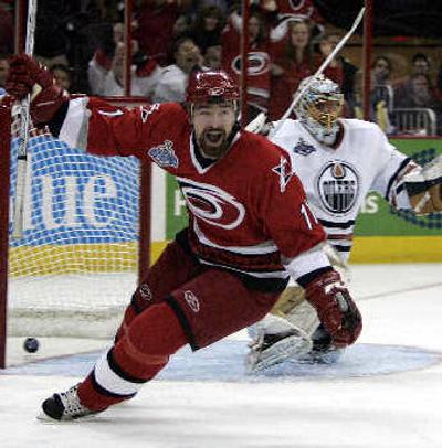 
Carolina's Justin Williams celebrates his third-period goal. 
 (Associated Press / The Spokesman-Review)