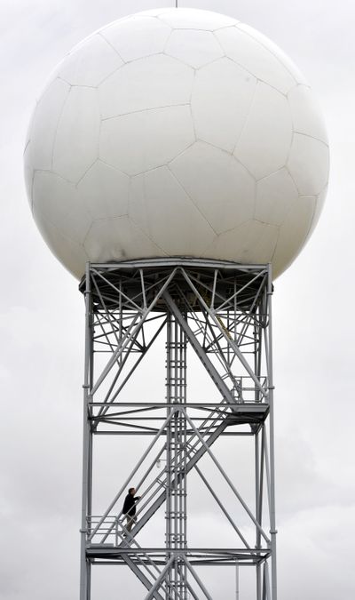 John Livingston, former meteorologist in charge at the National Weather Service-Spokane, climbs the stairs of the Doppler radar tower in 2011 near Airway Heights. On Thursday, U.S. Sen. Patty Murray expressed concern with the mass layoffs being experienced at the National Weather Service and what that could mean for farmers and fire season. (DAN PELLE/The Spokesman-Review)