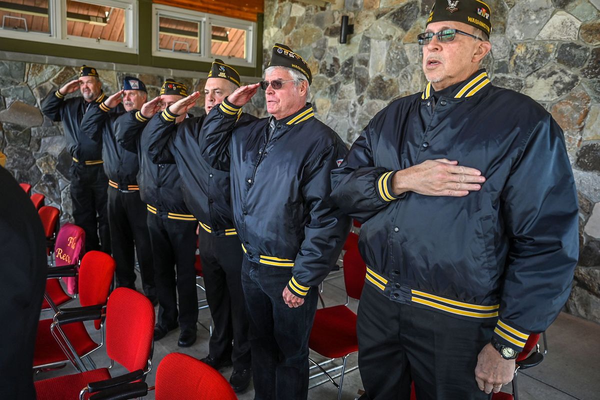 Members of the Spokane Area Veterans Honor Guard stand for the Pledge of Allegiance to begin a Forgotten Heroes ceremony, Wednesday, Nov. 8, 2023, at the Washington State Veterans Cemetery.  (DAN PELLE/THE SPOKESMAN-REVIEW)