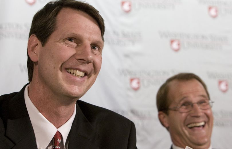 Ken Bone, the new head basketball coach at Washington State smiles with WSU athletic director Jim Sterk after making a joke about being friends with Washington Coach Lorenzo Romar during an introductory press conference on April 7, 2009 in a Bohler Gym conference room in Pullman, WASH. Bone, who has strong ties to the Pacific Northwest will worked with Sterk and Romar during separate coaching jobs earlier in their careers.  TYLER TJOMSLAND Special to The Spokesman Review (Tyler Tjomsland / The Spokesman-Review)