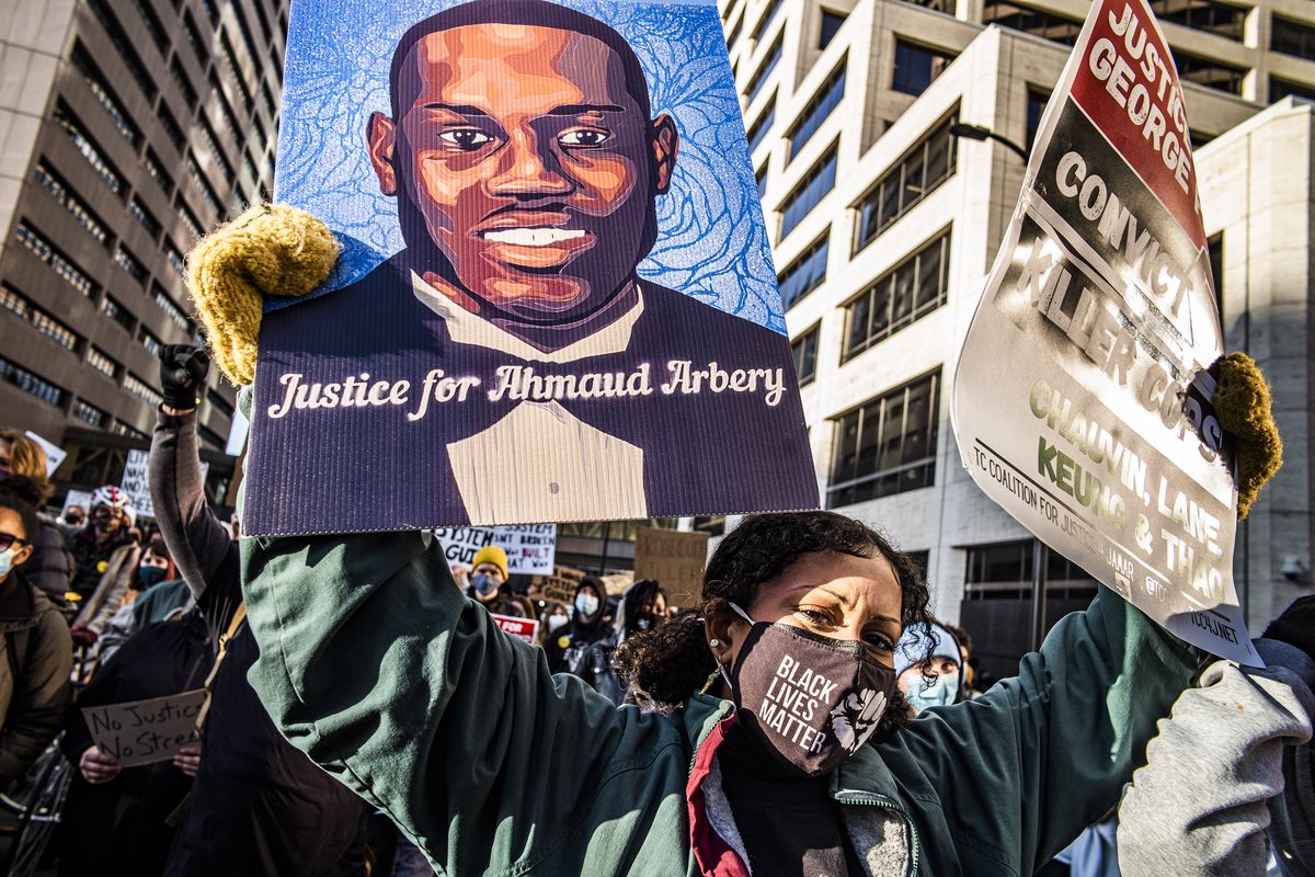 Protesters march downtown in Minneapolis, Minn., on the first day of the Derek Chauvin trial which began with jury selection, Monday, March 8, 2021.  (Richard Tsong-Taatarii)