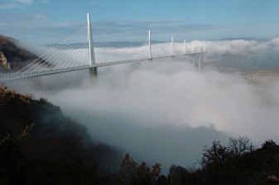 
The Millau bridge, the world's tallest traffic bridge, emerges through the fog in Millau, France. 
 (Associated PressAssociated Press / The Spokesman-Review)
