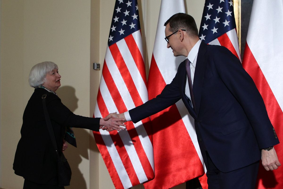 U.S. Treasury Secretary Janet Yellen, left, is greeted by Polish Prime Minister Mateusz Morawiecki before their meeting in Warsaw on Monday.  (Michal Dyjuk)