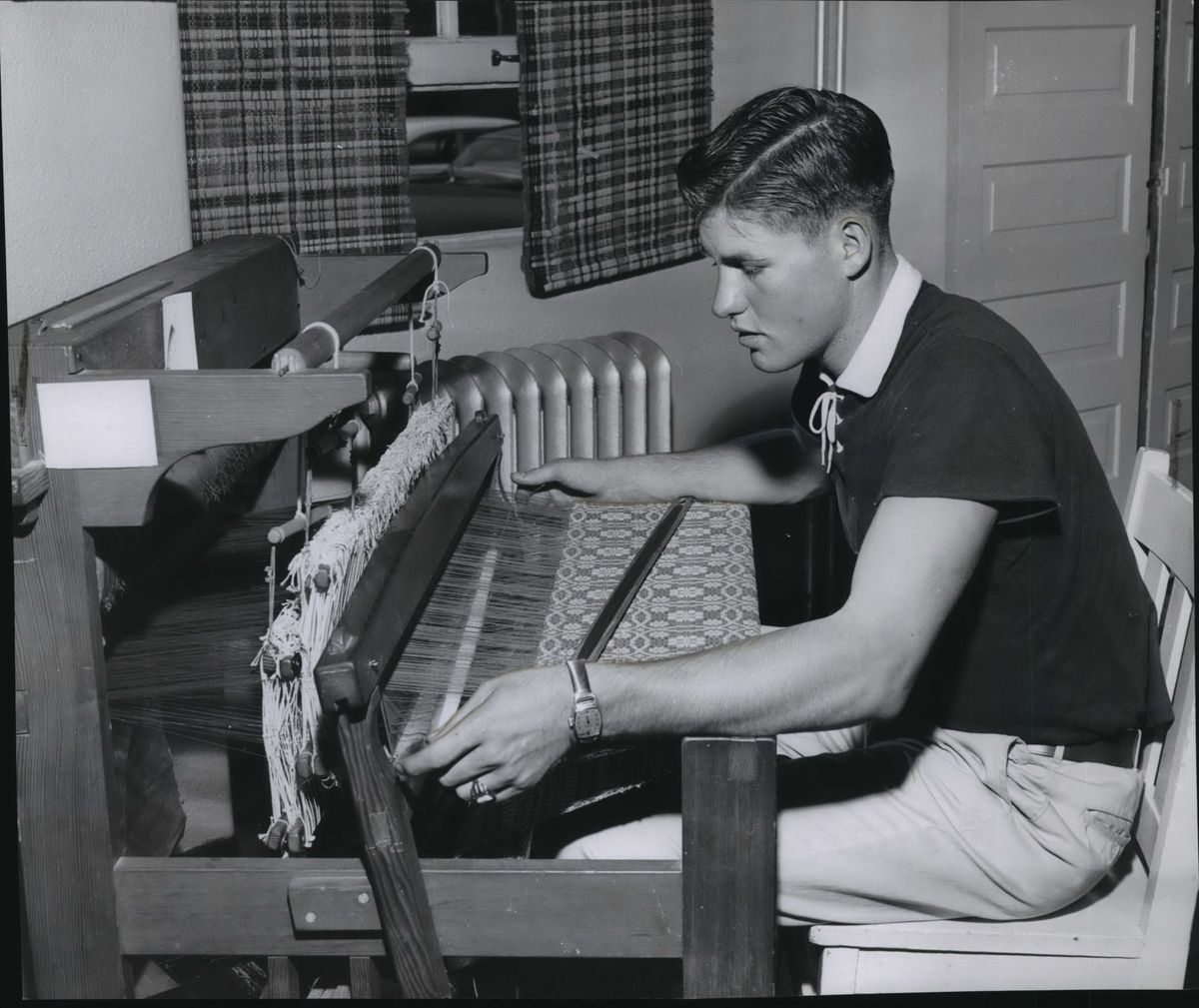 A boy at Lakeland Village learns weaving skills. Photo dated Dec. 5, 1957.  (Spokesman-Review archives)