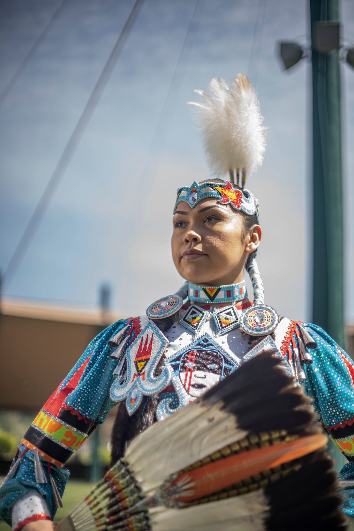 Taunie Cullooyah, a Jingle dress dancer and member of the Kalispel Tribe of Indians, poses during a photo shoot for the Native and Strong suicide prevention campaign.  (Counting Coup Media, Courtesy of Washington State Dept. of Health)