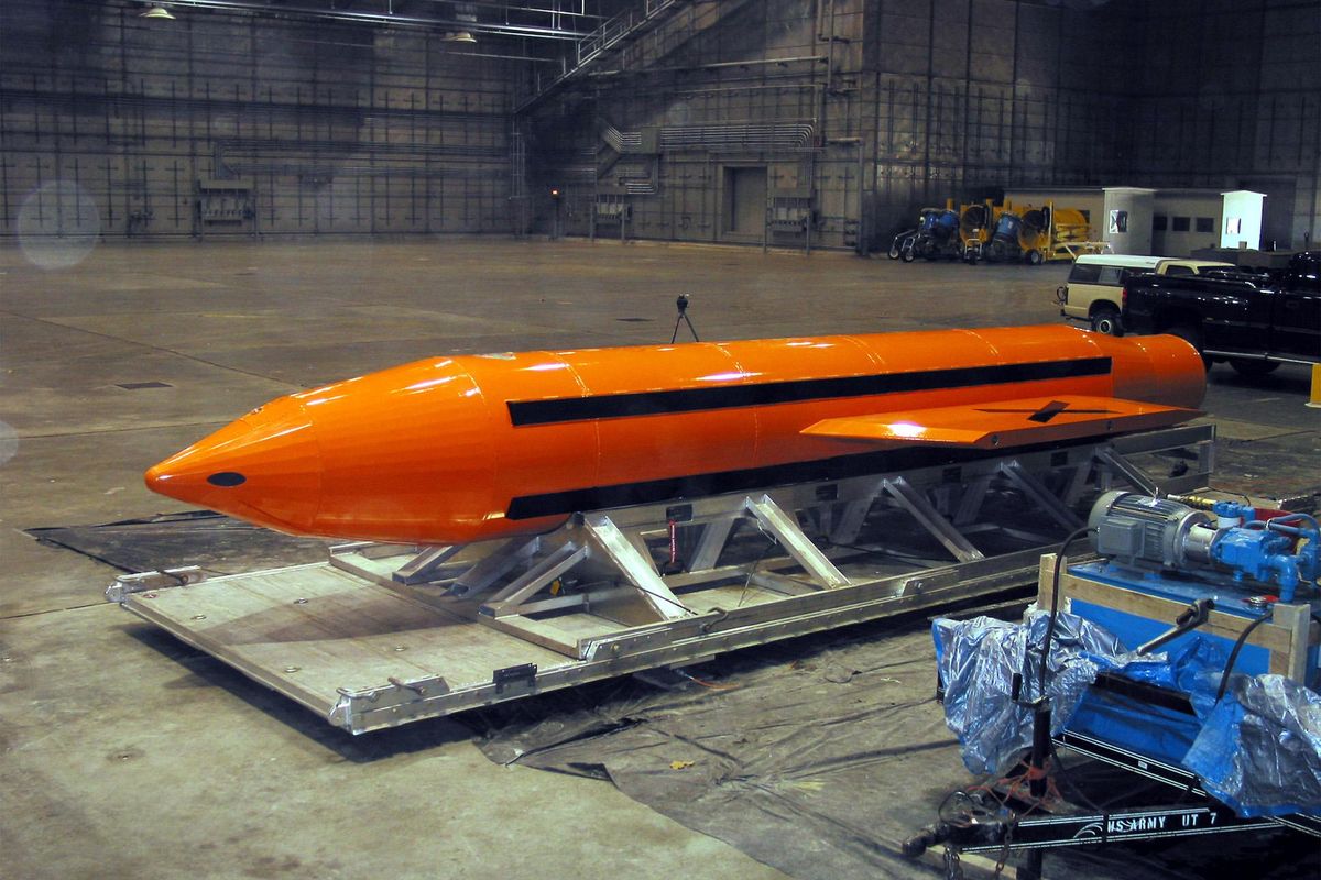 A Massive Ordnance Air Blast, or MOAB, weapon is prepared for testing at the Eglin Air Force Armament Center on Tuesday, March 11, 2003. The Air Force tested the MOAB, the biggest conventional bomb in the U.S. arsenal on Tuesday, March 11, 2003, in Florida. (AP)
