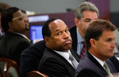 O.J. Simpson and attorneys Gabriel Grasso and Yale Galanter appear in court during the first day of jury selection for co-defendant Clarence “C.J.” Stewart and Simpson’s trial Monday in Las Vegas.  (Associated Press / The Spokesman-Review)