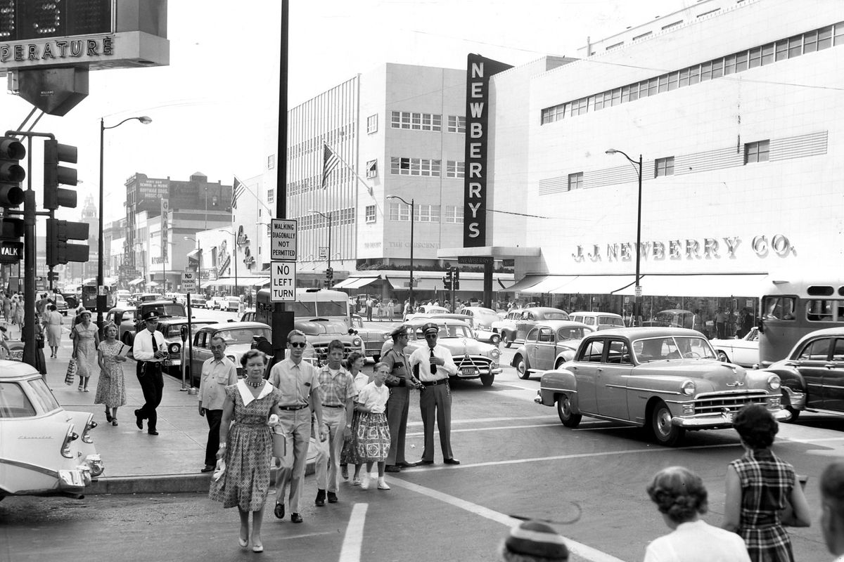 July 26, 1958: This view looks northwest at the corner of Riverside Avenue and Howard Street. The Newberry’s store can be seen on the right.