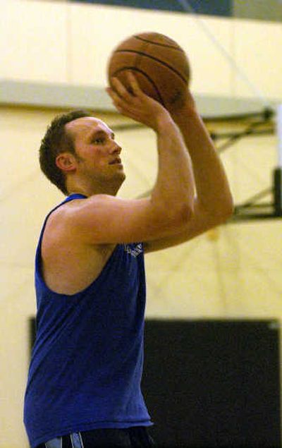 
Author N.D. Wilson practices free throws on Thursday. 
 (Brian Immel / The Spokesman-Review)