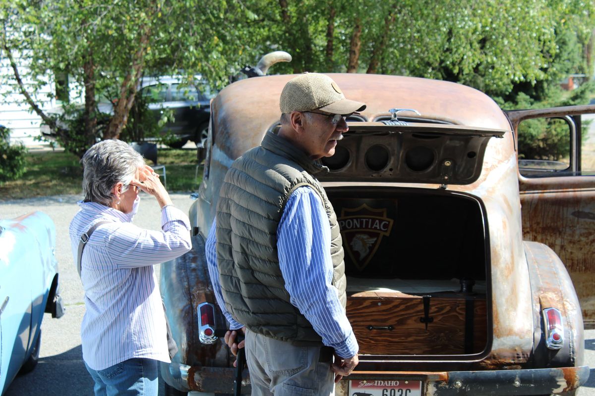 Attendees peruse mid-century cars at the inaugural Retro Revelry festival Saturday. (Courtesy image)
