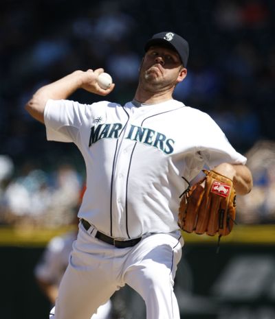 Seattle Mariners' pitcher Kevin Millwood throws against the Chicago White Sox in the third inning during a baseball game in Seattle, on Sunday April 22, 2012. (Kevin Casey / Fr132181 Ap)