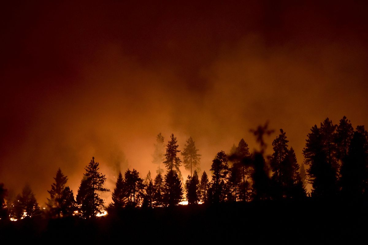 The Carpenter Road Fire, part of the Stevens Complex Fire, rages on Aug. 18, 2015, near Fruitland, Wash. (Tyler Tjomsland / The Spokesman-Review)