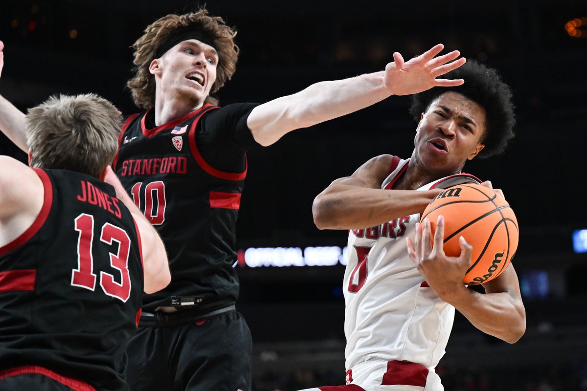 Washington State Cougars forward Jaylen Wells (0) rebounds the ball against Stanford Cardinal forward Max Murrell (10) during the first half of a Pac 12 basketball tournament game on Thursday, Mar 14, 2024, at T-Mobile Arena in Las Vegas, Nev.  (Tyler Tjomsland/The Spokesman-Review)
