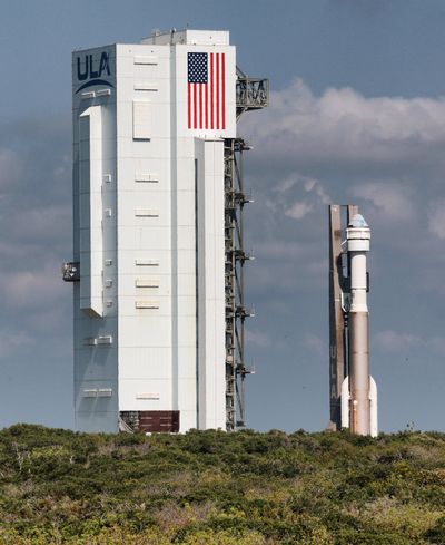 The Boeing CST-100 Starliner capsule topping a United Launch Alliance Atlas V rocket rolls out of the UAL Vertical Integration Building, headed for launch complex 41 at Cape Canaveral Space Force Station on May 17, 2022.   (Orlando Sentinel )