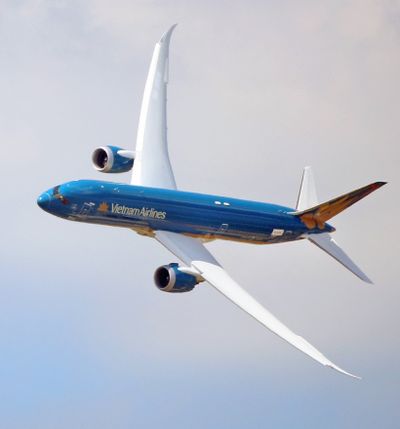 The Boeing 787 Dreamliner performs its demonstration flight at the Paris Air Show in Le Bourget, north of Paris, Tuesday. Some 300,000 aviation professionals and spectators are expected at this week’s Paris Air Show. (Associated Press)