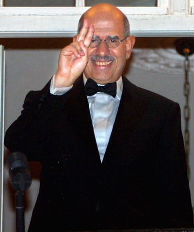 
Nobel Peace Prize laureate Mohamed ElBaradei flashes the peace sign from the balcony of the Grand Hotel in Oslo, Norway, on Saturday. 
 (Associated Press / The Spokesman-Review)