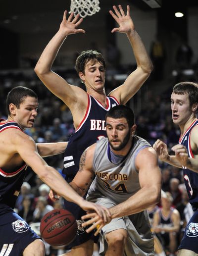 Lipscomb’s Adnan Hodzic of Bosnia, center, has scored 1,875 points in his career. (Associated Press)