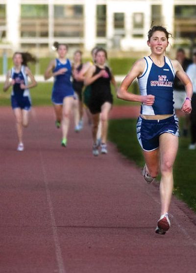 
Mt. Spokane's Megan O'Reilly leads the pack during the girls GSL track championship 1,600-meter race, winning in 5:04.2.
 (Kathryn Stevens / The Spokesman-Review)