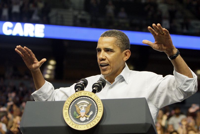 President Barack Obama gestures while addressing a health insurance reform rally Saturday in Minneapolis.  (Associated Press / The Spokesman-Review)