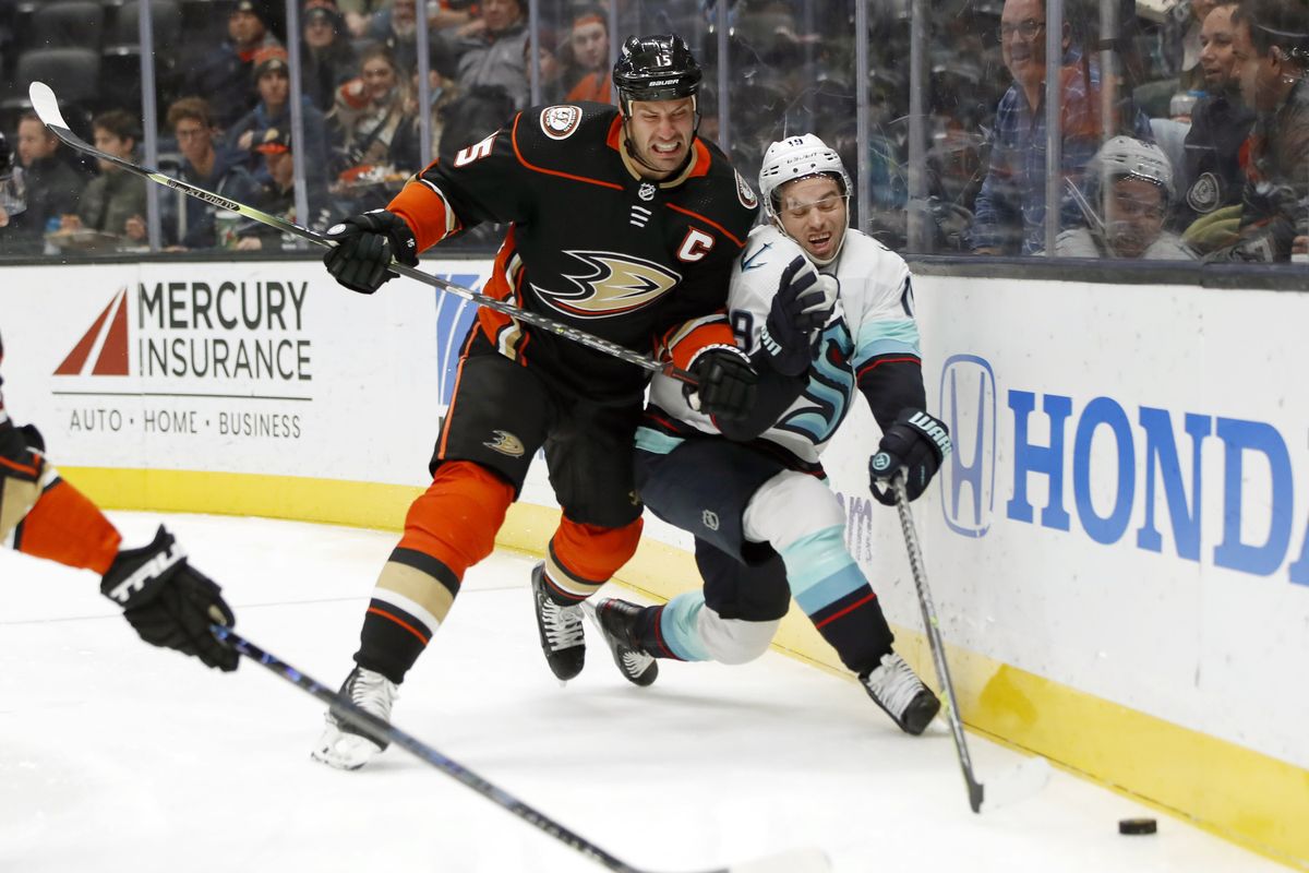 Anaheim Ducks center Ryan Getzlaf, left, collides with Seattle Kraken center Calle Jarnkrok during the first period of an NHL hockey game in Anaheim, Calif., Wednesday, Dec. 15, 2021.  (Alex Gallardo)