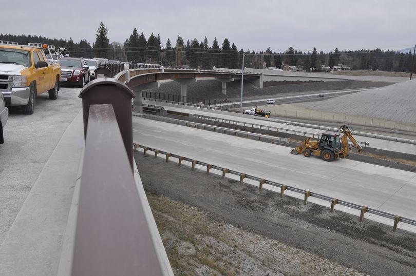 The new U.S. Highway 2 southbound flyover ramp to the North Spokane Corridor was opened on Wednesday. Vehicles had parked on the ramp for a ribbon cutting prior to opening.  (Mike Prager)