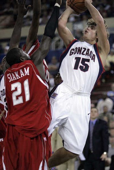 
Gonzaga's Matt Bouldin shoots against Western Kentucky's Boris Siakam during Thursday's game at Anchorage, Alaska.  Associated Press
 (Associated Press / The Spokesman-Review)