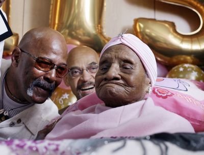 Gertrude Baines, far right,  celebrates her 115th birthday Monday in Los Angeles. She was born in Shellman, Ga. (Associated Press / The Spokesman-Review)